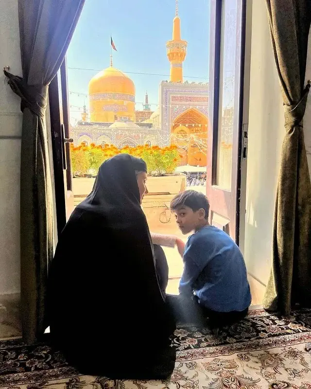 Gloria Hardy and her child at the shrine of Imam Reza 2